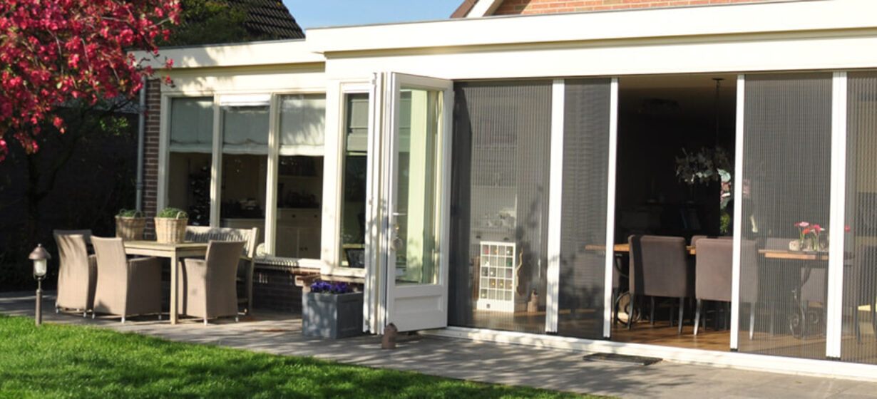 HW Huis & Wonen Gorinchem Plissehordeur tuin openslaande deuren